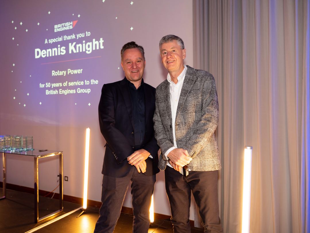 Photo of Dennis Knight receiving an award for 50 year's service at the British Engines Group, presented by Chairman Alex Lamb.