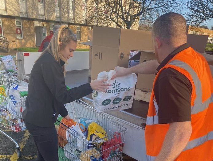 Employees donate to food banks